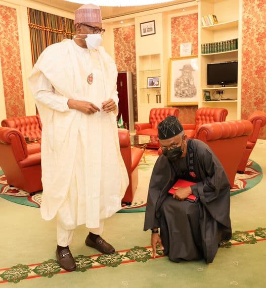 State Governor Knelt Down Before Buhari Regardless Of His Statue